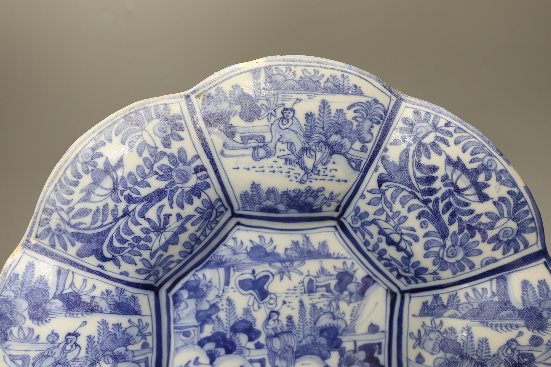 A Delft blue and white chinoiserie lobed dish, c.1700, 35cm diameter